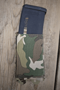 elastic 5.56 mag pouch with a mag in it.