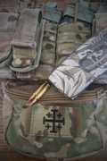 Jerusalem Cross MTP patch on a chest rig with a 5.56 emag templar design.