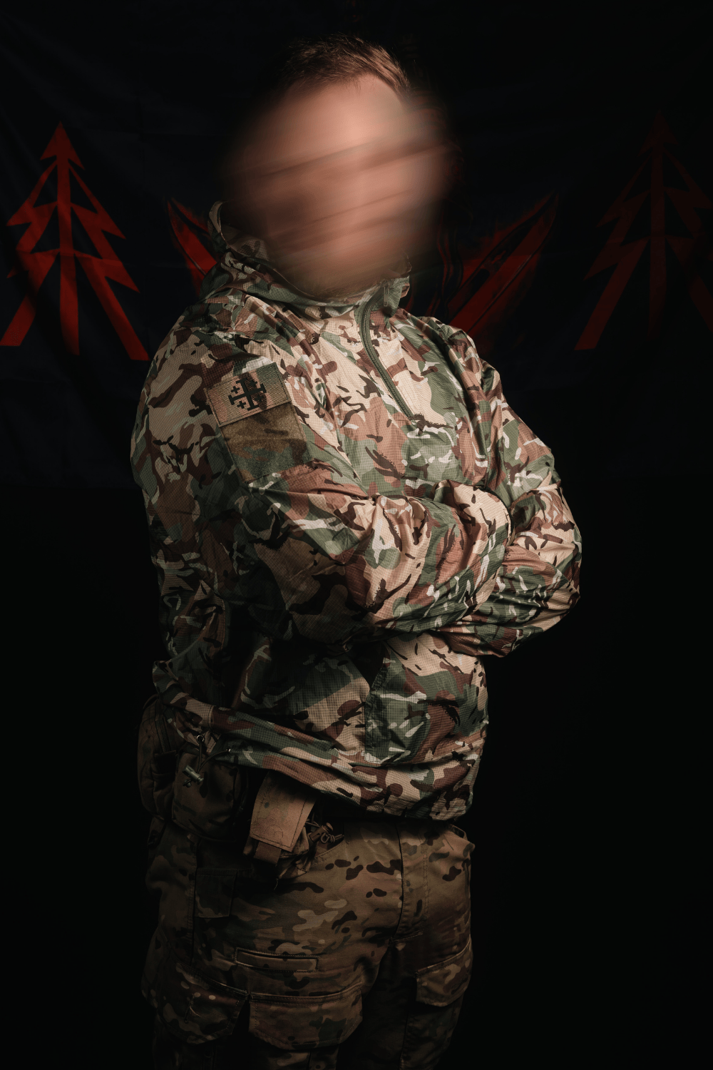 The Mora Tactical MTP Stowaway Waterproof Jacket being worn by a British Recc Soldier.