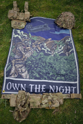 Own the night UKSF flag with british UKSF kit lay out on top of it.